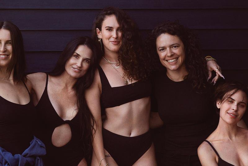 Five women posing for an advetising campaign for swimsuits